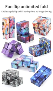 Detail showing infinity cubes in galaxy and marble patterns with various folding states