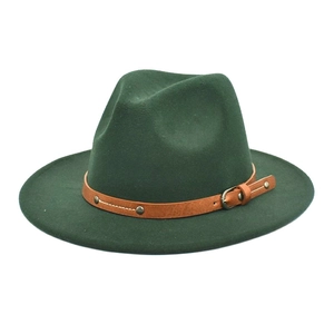 Detail of dark green wool fedora with brown leather strap and decorative metal studs