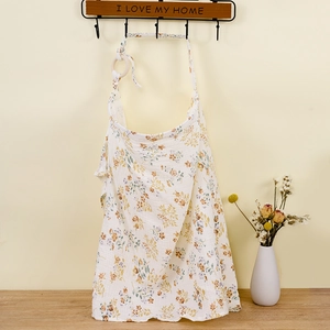 Detail of vintage floral muslin nursing cover made from breathable double-layer cotton fabric
