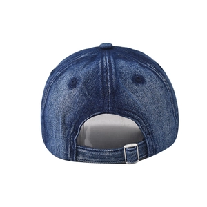 Detail view of washed denim baseball cap back with adjustable metal buckle strap