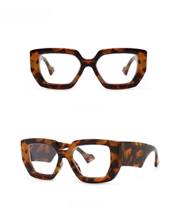 Detailed front and side views of vintage leopard print square eyeglasses with clear lenses