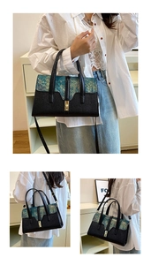 Detail of blue fish-scale texture and black leather bag with gold rotating lock