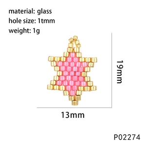 Pink and gold glass star pendant with 19mm height and 13mm width dimensions