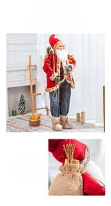 Detail of Santa Claus decoration showing texture of burlap bag and festive plush outfit