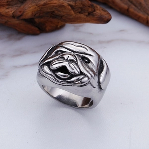 Detailed relief of a pug dog head on a vintage silver titanium steel ring for men