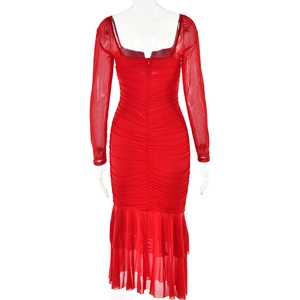 Detail of red long sleeve mesh dress showing fishtail hem and ruched bodice textures