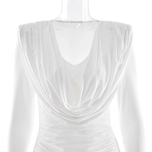 Detail of white V-neck mini dress showing ruched elastic fabric and deep neckline texture