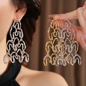 Luxury oversized hollow wave earrings with sparkling crystals for elegant evening wear