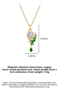 Macro detail of peacock pendant necklace with green gemstones and white zircon in titanium steel