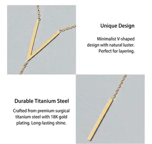 Macro detail of V-shaped and vertical bar pendants in 18K gold plated titanium steel