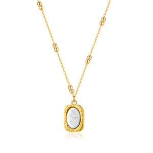 Collana vintage dorata con ciondolo a rosa in rilievo e catena con piccole sfere