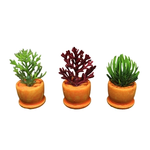 Set de tres mini plantas suculentas artificiales en pequeñas macetas naranjas decorativas