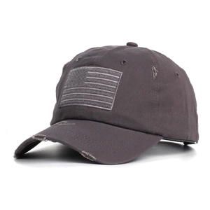 Close-up of distressed charcoal grey baseball cap with American flag embroidery detail