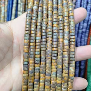Macro shot of natural 3x6mm jasper and agate spacer beads for DIY jewelry making
