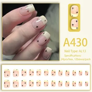 Short French style press-on nails with pink base and black star patterns set of 24 pieces