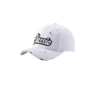 Detail of white cotton baseball cap with black Classic embroidery and distressed accents