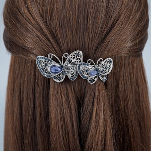 Barrette vintage argentée avec double papillon en strass bleus pour femme chic