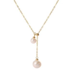 Elegant Y-shaped gold titanium steel necklace with two white pearls on white background