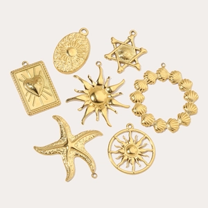 Gold bohemian stainless steel charms including starfish, sun, and love heart pendants