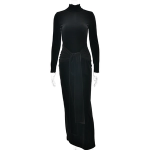 Elegant black long sleeve slim fit maxi dress with a turtleneck and knotted waist detail