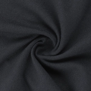Detailed macro shot of fine black ribbed knit fabric showing elastic texture and soft quality
