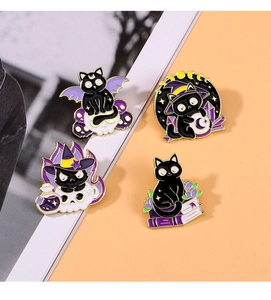 Four punk style black cat enamel pins featuring magic book and skeleton moon designs