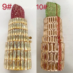 Detail of luxury lipstick-shaped evening clutches with sparkling champagne crystals