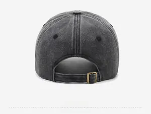 Detail view of the vintage washed gray baseball cap featuring an adjustable metal buckle