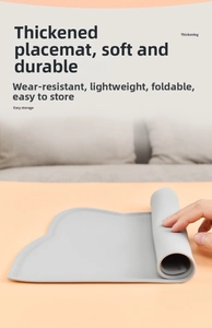 Detail view of thickened silicone pet mat showing high flexibility and easy roll-up storage