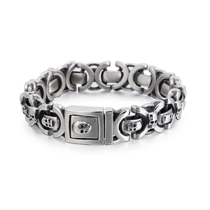 Bracciale da uomo punk retrò con teschi in acciaio inossidabile ossidato con catena