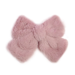 Soft pink plush bow hair clip made of faux fur for autumn and winter hair styling