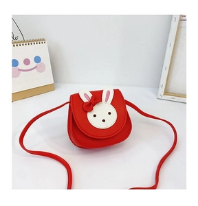 Close-up of bright red bunny-shaped PU leather crossbody bag for kids with bow detail