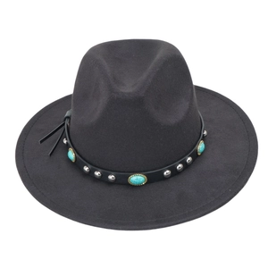 Detail of wool felt cowboy hat featuring silver studs and turquoise stones on a leather band
