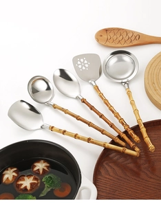 Close-up of 5-piece 304 stainless steel kitchen tool set with natural bamboo handles