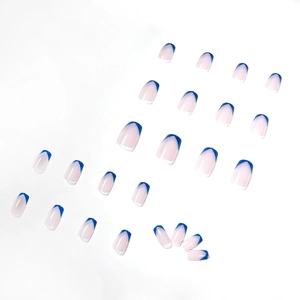 Translucent pink press-on nails with blue V-shaped French tips, 24-piece set in medium-short