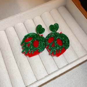 Halloween acrylic poison apple heart earrings with red and green glitter skull design