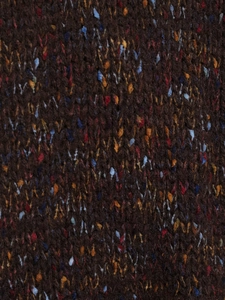 Close-up of vintage dark brown knit fabric with colorful flecks and tweed texture