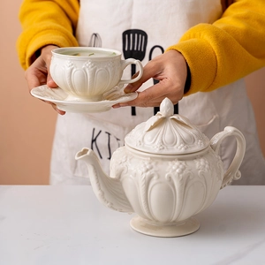 British vintage relief ceramic coffee pot and teacup set in creamy white finish