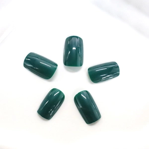 Glossy dark green long square press-on nails with minimalist elegant finish on white backdrop