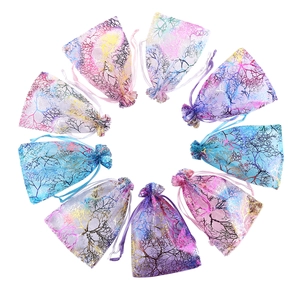 Colorful organza gift bags with drawstring closure and coral patterns in various colors