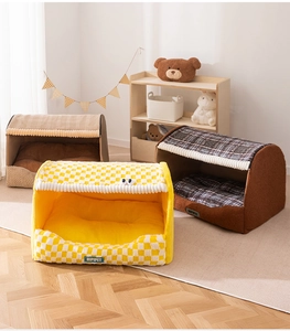 Detail of semi-enclosed plush pet beds in yellow and brown patterns with soft inner cushions