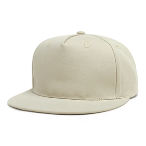 Detail of light khaki flat brim baseball cap showing cotton twill texture and 5-panel design
