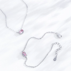 Elegant S925 sterling silver necklace and bracelet set with pink oval gemstone