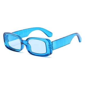 Retro thick frame rectangular sunglasses with blue lenses and translucent blue finish