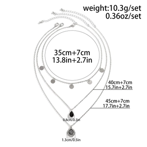 Detailed layered necklace set size guide with faux pearls, silver chains and coin pendants