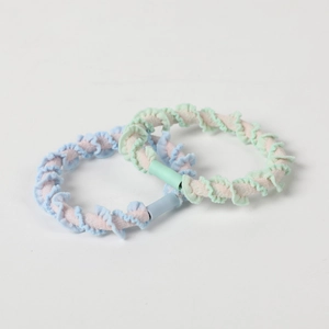 Minimalist elastic hair scrunchies set with ruffle edges in pastel blue and green tones