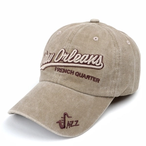 Close-up of vintage washed cotton baseball cap with New Orleans jazz themed embroidery