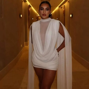 Detail of white ruched mini dress featuring a stand collar and elegant cape sleeves