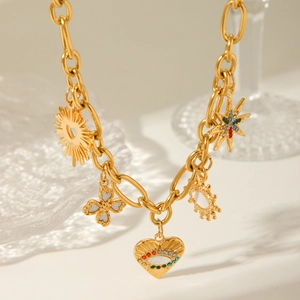 Gold stainless steel evil eye necklace with sun, heart, and star pendants for women