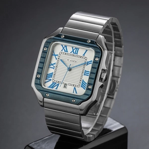 Detail of square business watch with blue bezel, roman numerals and date window